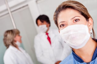 Female doctor at the hospital wearing a facemask